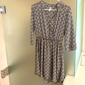 Love this dress. You can dress it up or dress it down. Size Medium.